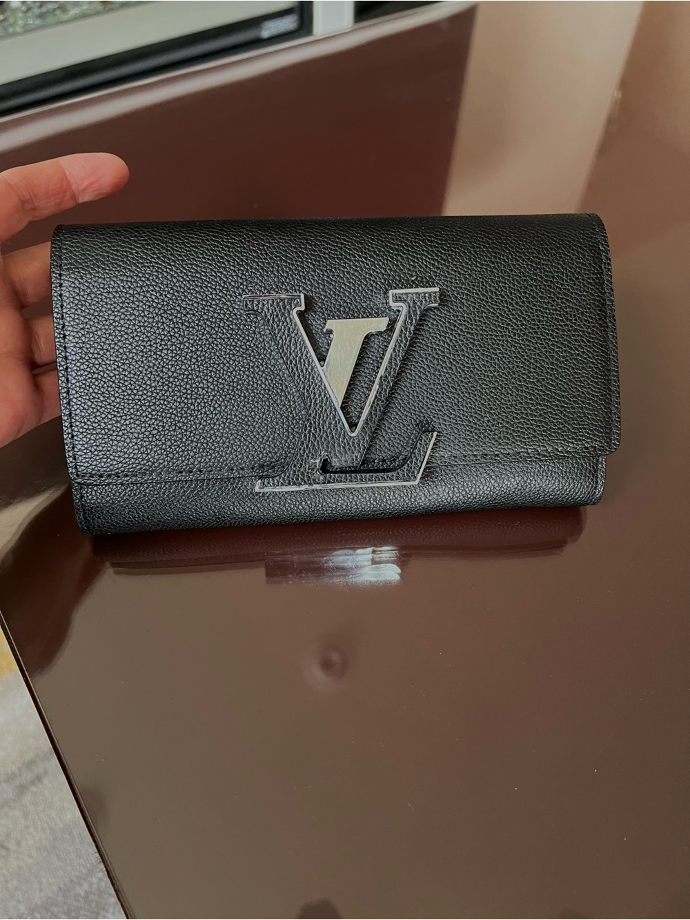 Louis Vuitton capuccines Black Leather Flap wallet